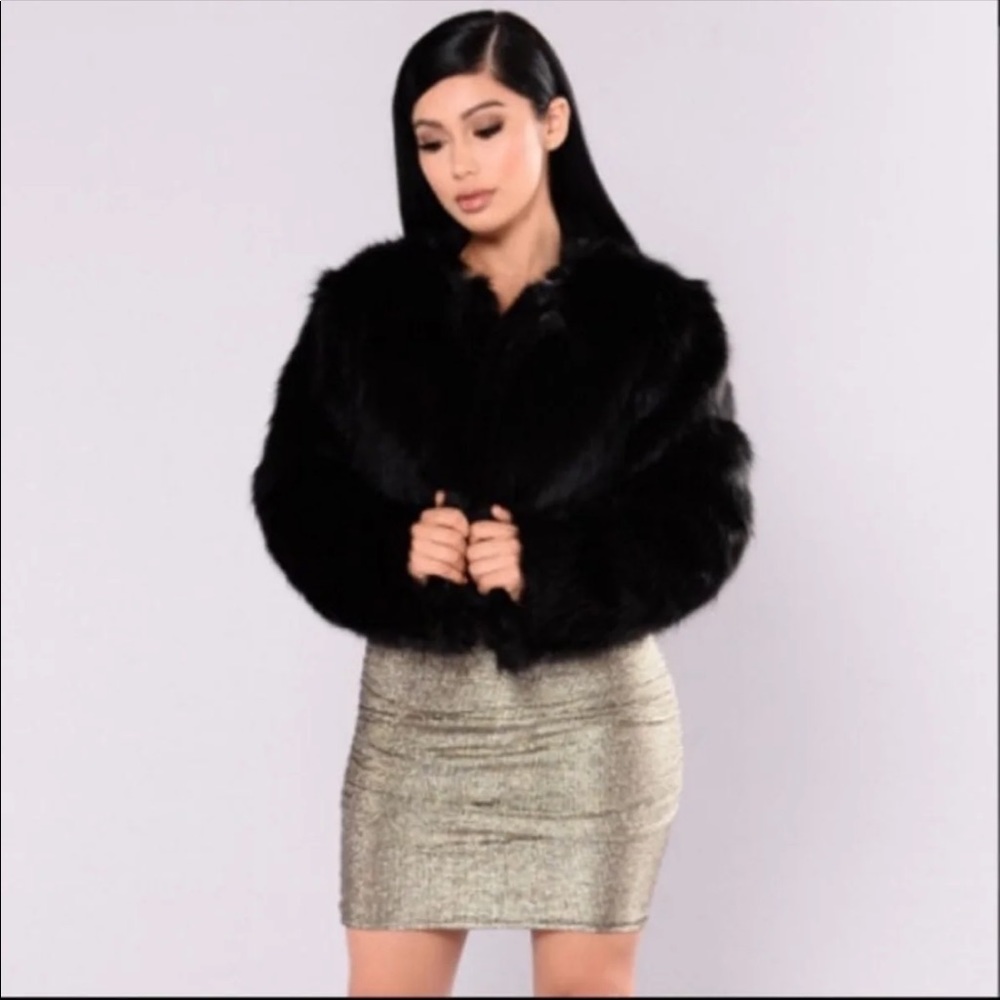 Faux fur coat. Great condition. Medium 8-10